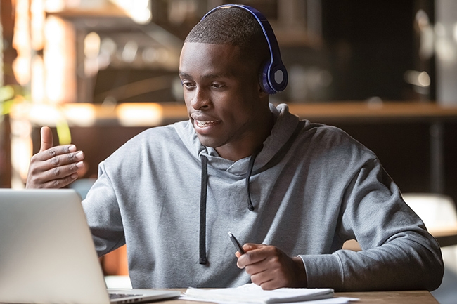 African American college student on video call