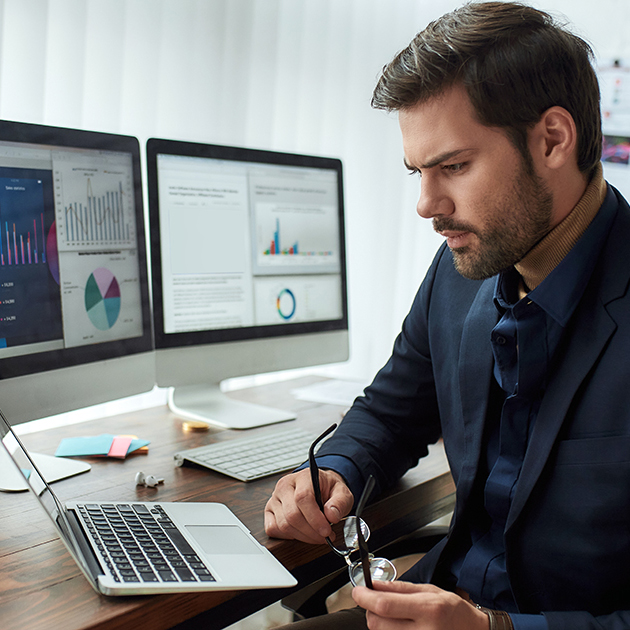 Man looking at a laptop