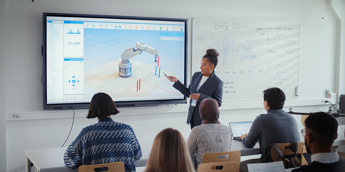 a faculty member at the board teaching college students