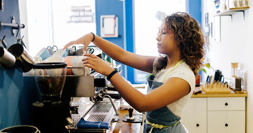 a young women is working in a cafe