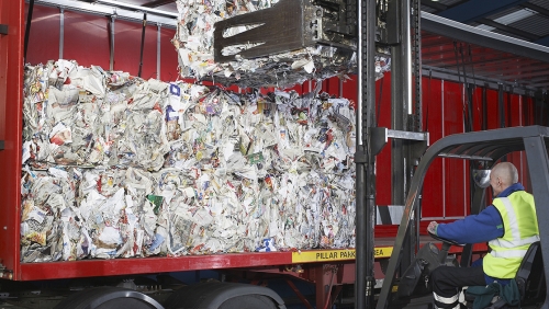 a worker on a recycling facility