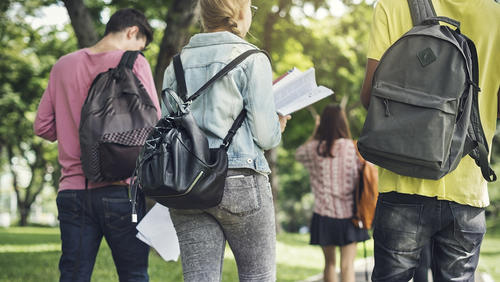 a group of students with backpacks