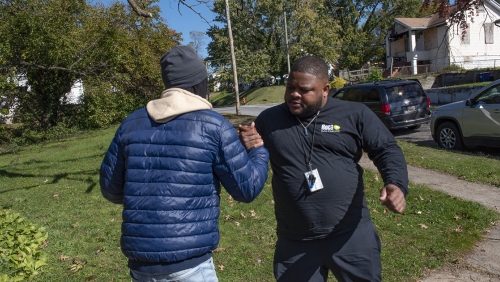 ROCA team person saying hello to program participant