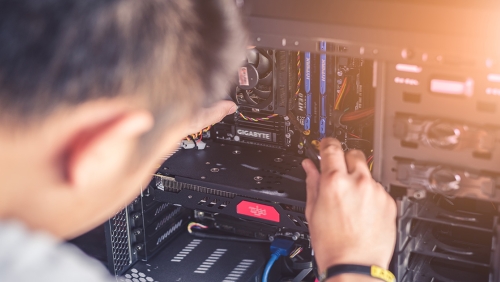 Man working on electronics