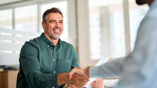 two men shaking hands