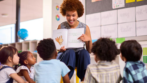 a teacher with elementary school kids