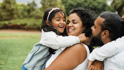 mother and father with little kids