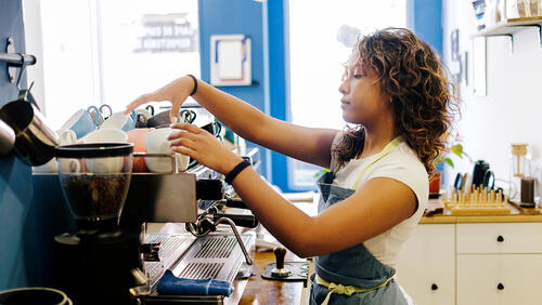 a young women is working in a cafe