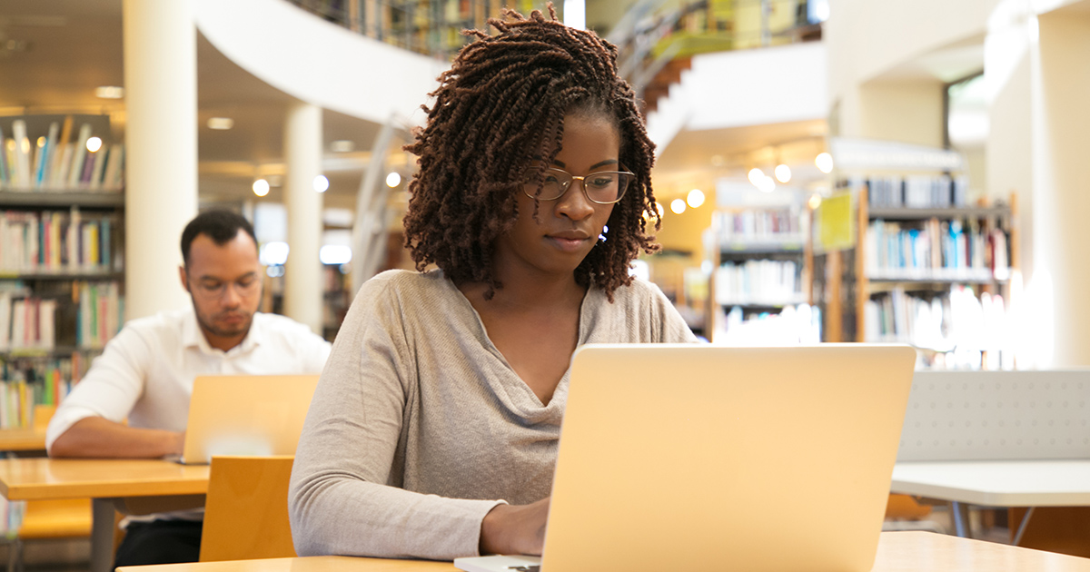 Black female student in college library