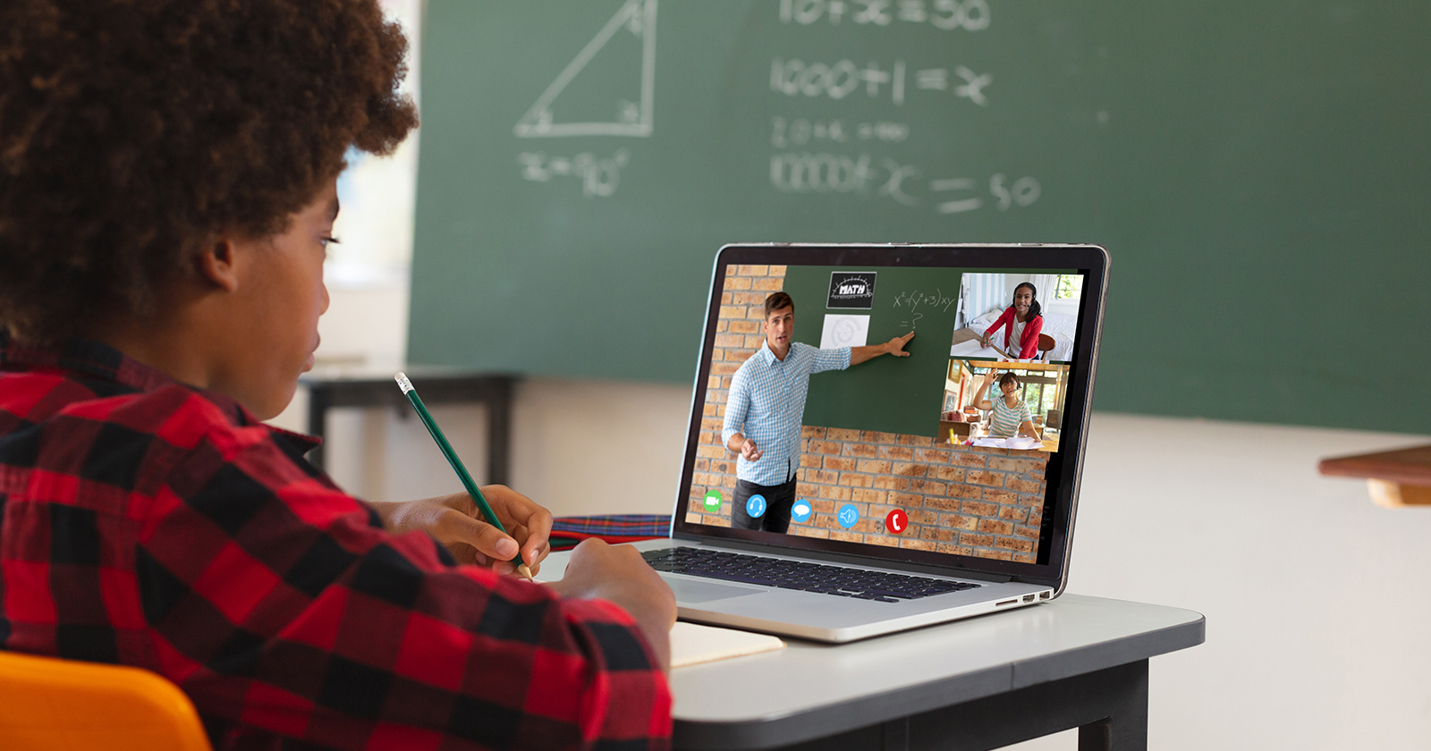 A Black high school student participates in an online tutoring session