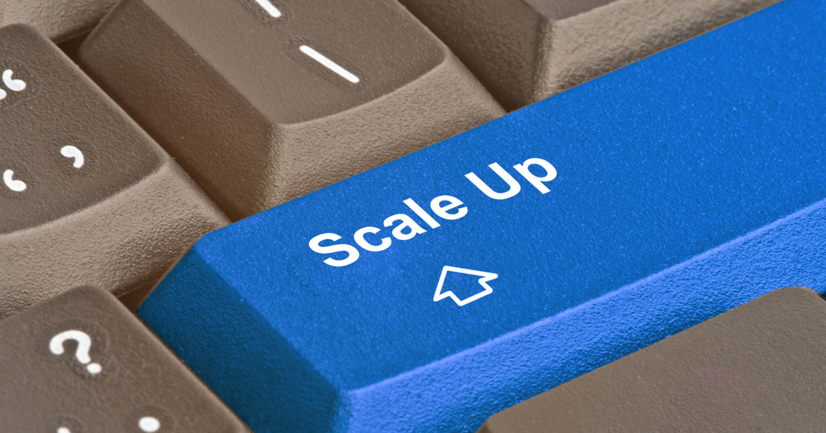 Close-up of a computer key that reads "Scale Up"