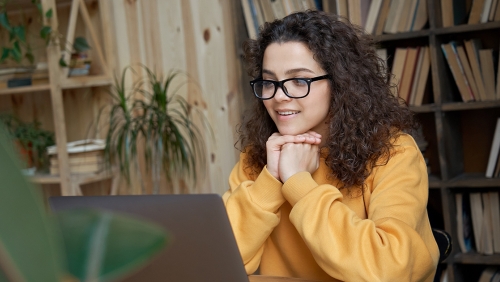 a student is in front of computer