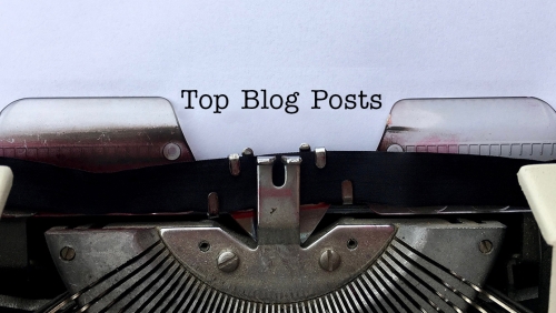 Paper in typewriter that reads Top Blog Posts