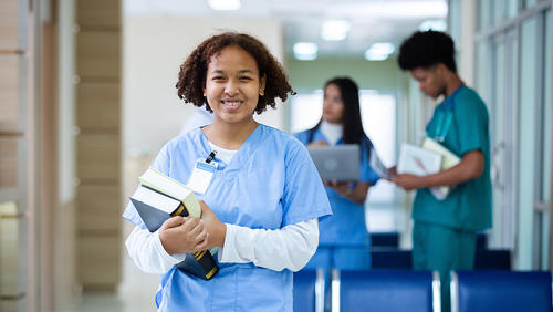 A nurse student with books