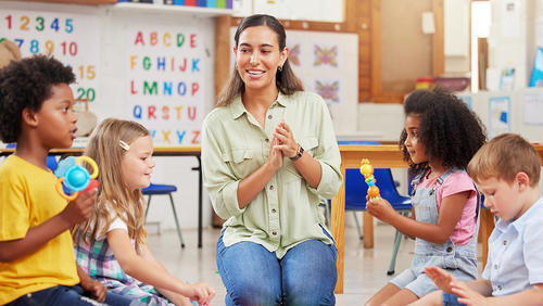 a teacher among elementary school kids