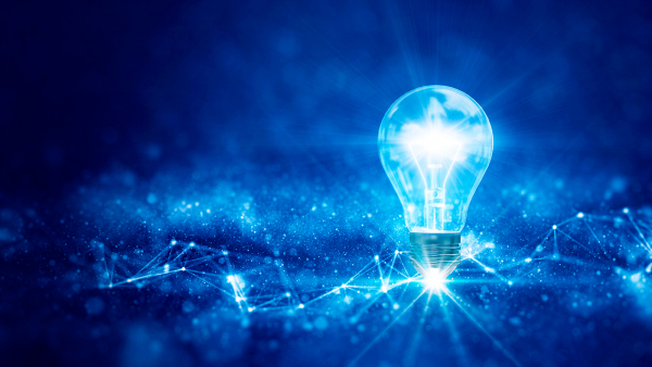 Lightbulb illuminating darkness